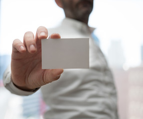Hand hold blank white card mockup. Plain call-card mock up template holding arm. Plastic credit namecard display front. Check offset card design. Business branding.