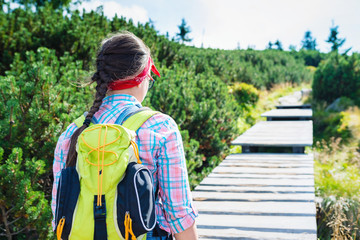 Hiking girl in the mountains