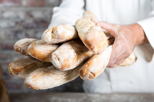 Baker Holding  Traditional Bread French Baguettes