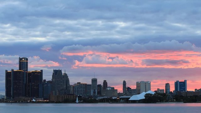 Timelapse of Detroit Skyline from Belle Island during sunset 4K