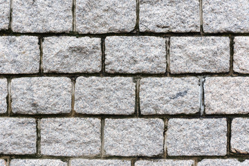 Wall of rough stone tiles