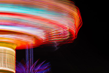 Motion Blur of a swing carousel at night