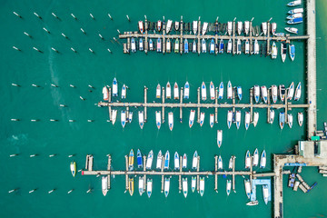 Obraz premium Topview Marine station Luxury yachts and private boats seaport in Marine station complex , Pattaya province Thailand