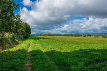 The street in the green fields somewhere in Germany