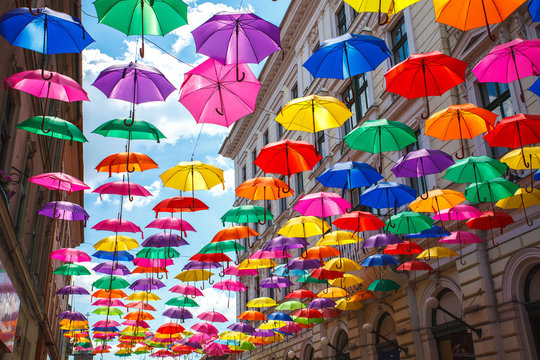 Street decorated with colored umbrellas