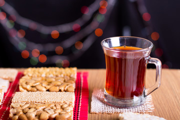 Collection of Beans Candies and Sweets ( Mawlid Halawa ) with Cup of Red Tea