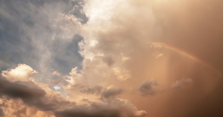 Dramatic atmosphere panorama view of beautiful sunset sky and clouds with rainbow.