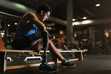 Portrait of disabled young in the gym.