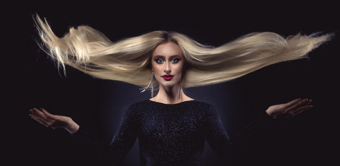 Beautiful girl with flying hair