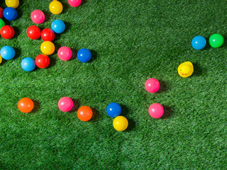 Colorful Balls on green grass
