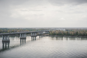 The bridge through the river. Bolshoy Bridge through the river. Krasivy Bridge through the river.