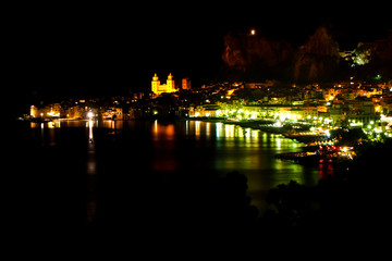 Night view to romantic city Cefalu, north Sicily