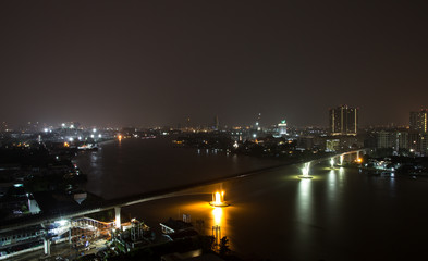 Fototapeta na wymiar Landscape view of Bangkok with Chao Phraya river at night, Bangkok Thailand
