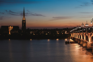 Fototapeta na wymiar Pont de Pierre bridge at twulight, Bordeaux, France