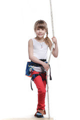 Girl climber on a white background looks at the camera