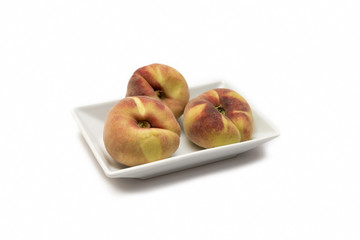 Peaches On A Plate Isolated On White Background