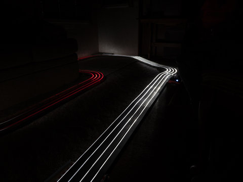 Utilizing two slot cars to paint with light.