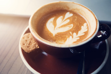 Cup of coffee on table, coffee cafe shop.