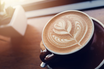 Cup of coffee on table, coffee cafe shop.