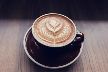 Cup of coffee on table, coffee cafe shop.