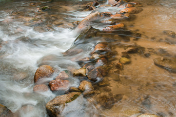 Stone in waterfall.