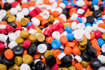 Fototapeta na wymiar Mix Plastic pellets. Colorant for plastics.