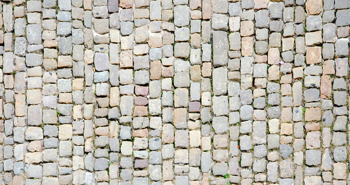 Cobblestone. Ancient stone floor texture
