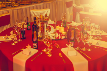 Wedding tables with decoration and dishes in the restaurant. Vintage tone