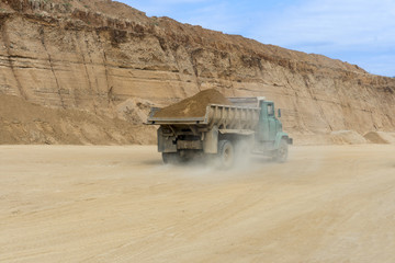 dumper truck with loaded sands  in a quarry