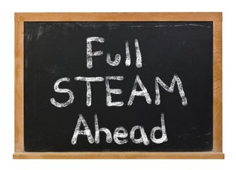 Fototapeta premium Full STEAM ahead written in white chalk on a black chalkboard isolated on white