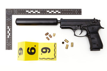 Police evidence of handgun with illegal hand made silencer and ammunition