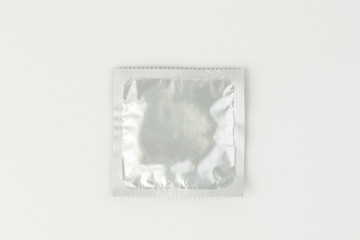 Condoms isolated on white background.