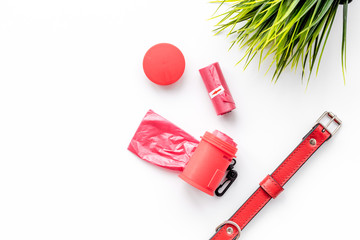 red grooming tools for training pet with collar on white background top view mock-up