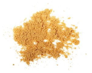 Unrefined light brown cane sugar pile isolated on white background, top view