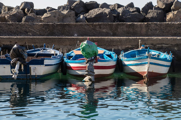 Fishermen boats at the port of san giovanni cutes them, catania