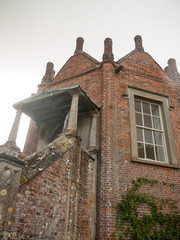 close up of small built outhouse mansion manor