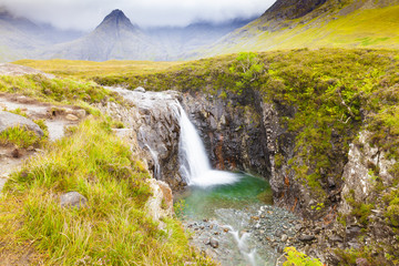 Fairy Pools footpath with waterfall Skye island Scotland