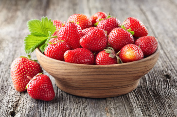 Strawberry on a old wooden background