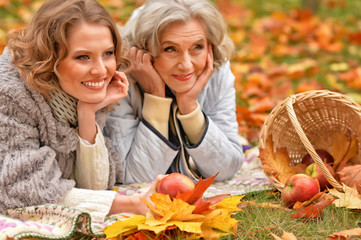Senior woman with daughter resting 