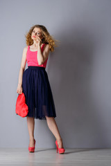 Beautiful young woman with a heart