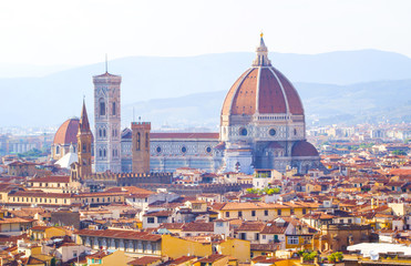 Fototapeta na wymiar Cityscape building,urban,town aerial view under blue bright sky of Firenze (Florence), Italy.