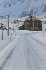 Fototapeta premium Old ruined-abandoned barn-wooden plank hut-Strandveien road to Ytresand. Fredvang-Moskenesoya-Lofoten-Norway. 0414