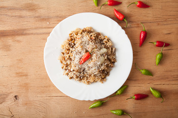 Lentils and rice with chilli pepper.