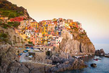 Fototapeta na wymiar Beautiful view of Manarola villages in Cinque Terre one of five lands famous colorful and beautiful villages in Italy, and the city has been ceded to UNESCO World.