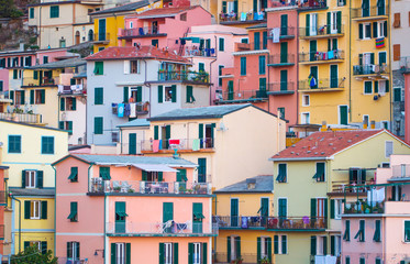 Fototapeta na wymiar Beautiful view of Manarola villages in Cinque Terre one of five lands famous colorful and beautiful in Italy, and the city has been ceded to UNESCO World, landscape is the mountainside by the sea.