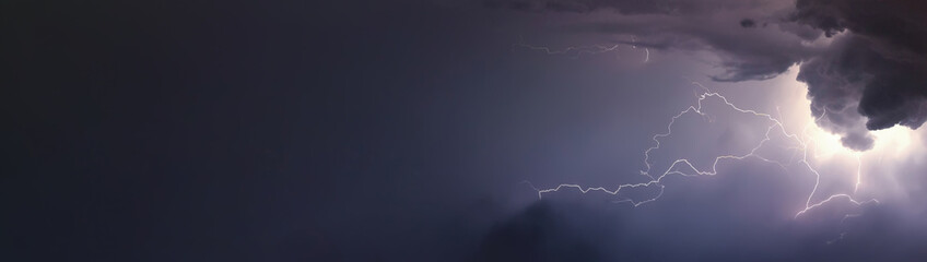 Huge lightnings and thunder during heavy summer storm. - obrazy, fototapety, plakaty