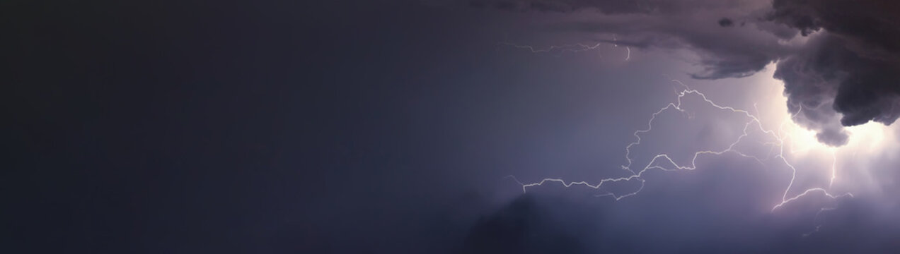 Huge lightnings and thunder during heavy summer storm.