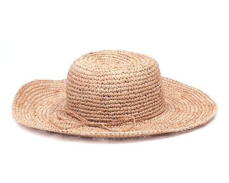 Stylish straw summer tan hat isolated on white background