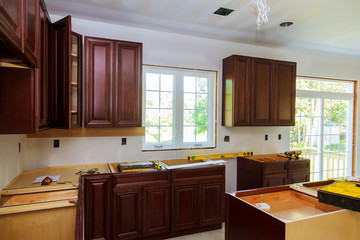 Installing new induction hob in modern kitchen