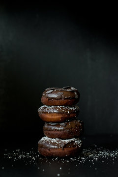 Homemade baked donuts with chocolate and coconut
